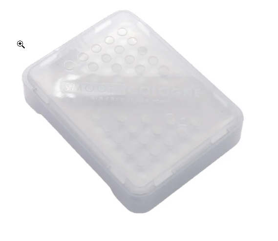 Clear plastic soap dish with holes on a white background